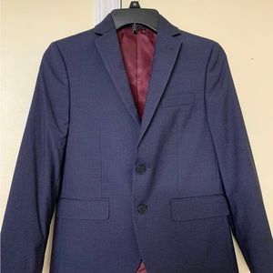 Boys size 12, 3 piece suit in blue. Bought in Mens Warehouse.Worn once, like new